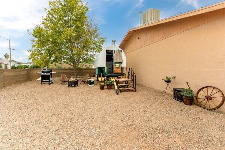 The outdoor space provides a welcoming space for guests to enjoy a cold beer, or a quick round of cornhole.