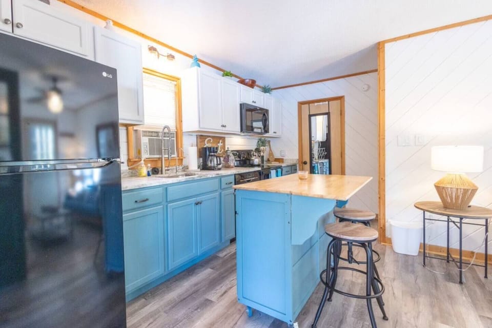 A view of the kitchen as you walk into the cabin.  The kitchen was completely renovated in 2022.