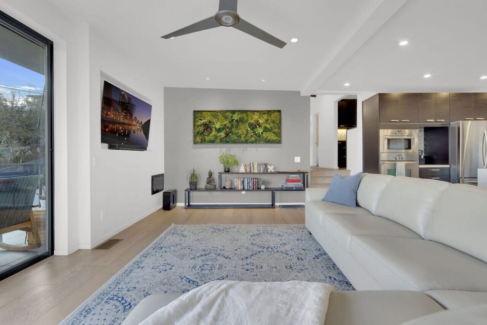 Main Living Area: Bright and airy space with lush decor, perfect for relaxation and entertainment!