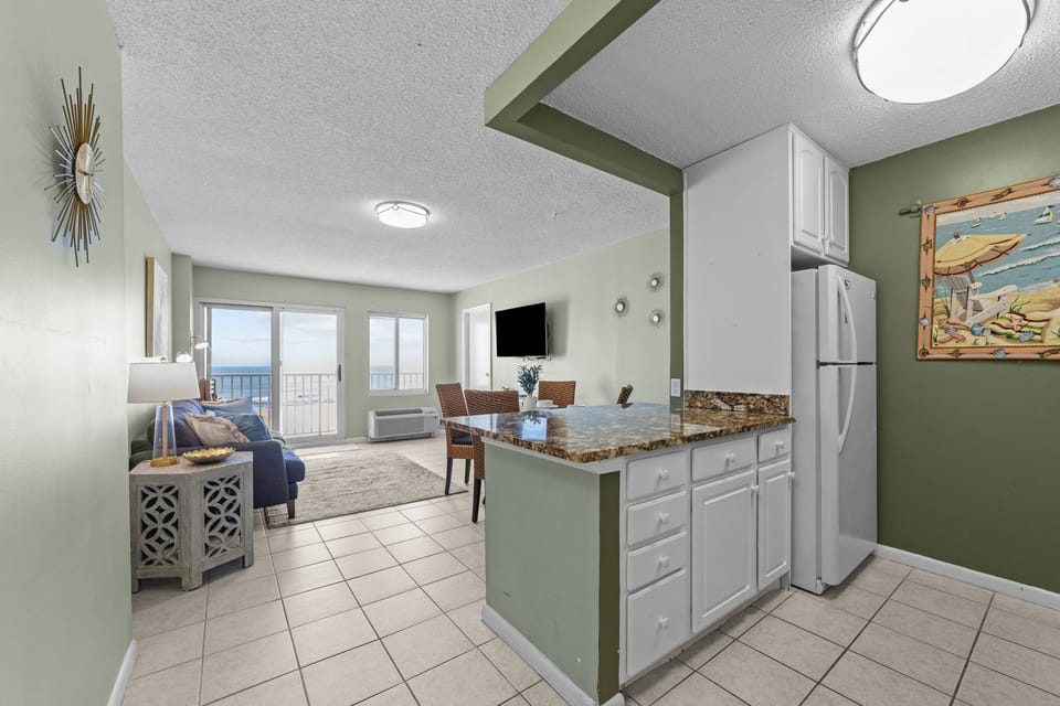 Open floor plan - Kitchen, family room and eating area overlooking the boardwalk at the Oceanfront