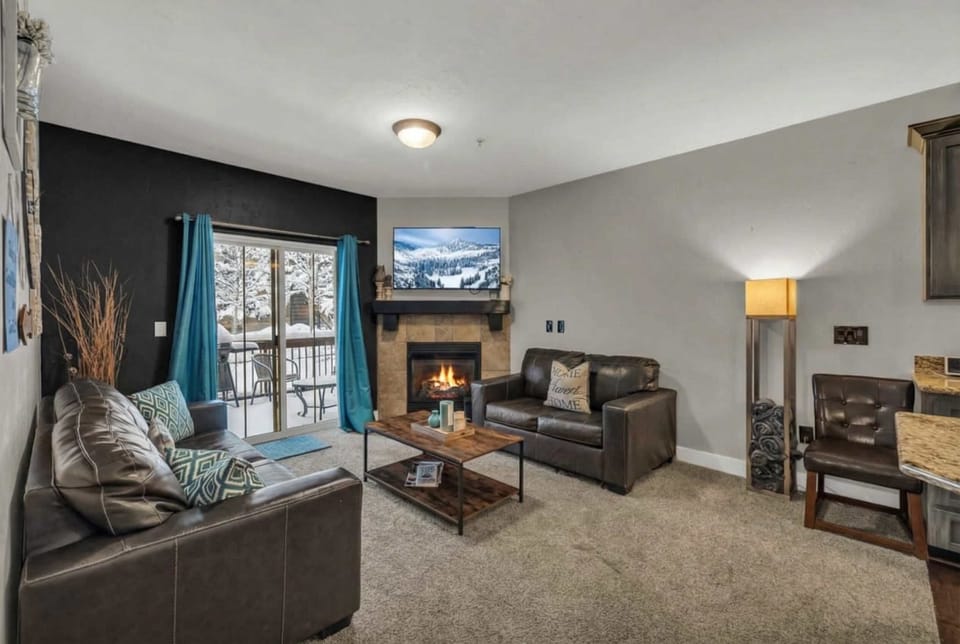 This charming 3-bedroom condo is located near Olypmic Park. Please note the fireplace is only available in the winter. 