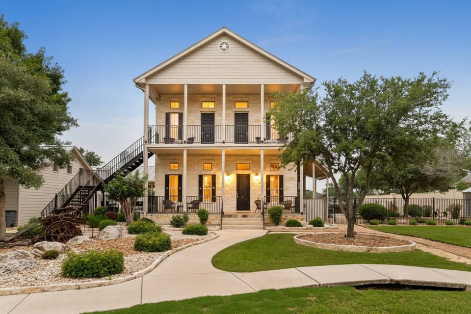 Exterior view. Guests must ascend the staircase on the left to access #25 (left) and #26 (right) at Gruene Silo Inn.
