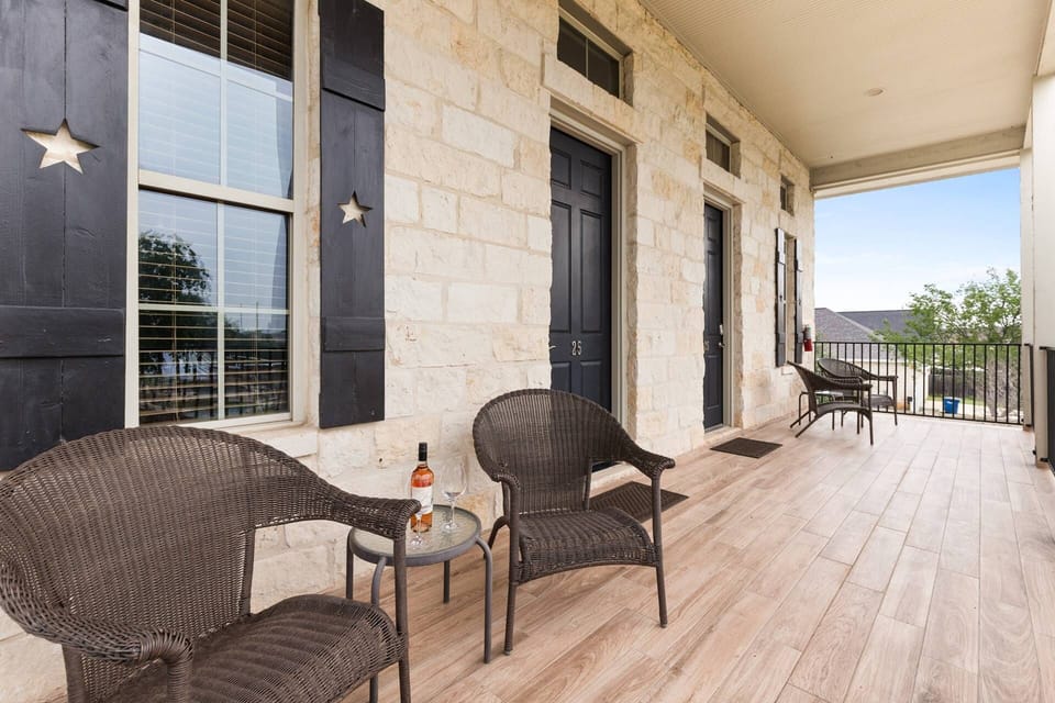 #25 and #26 at Gruene Silo Inn share an expansive front porch, the perfect space for enjoying morning coffee or evening sunsets.