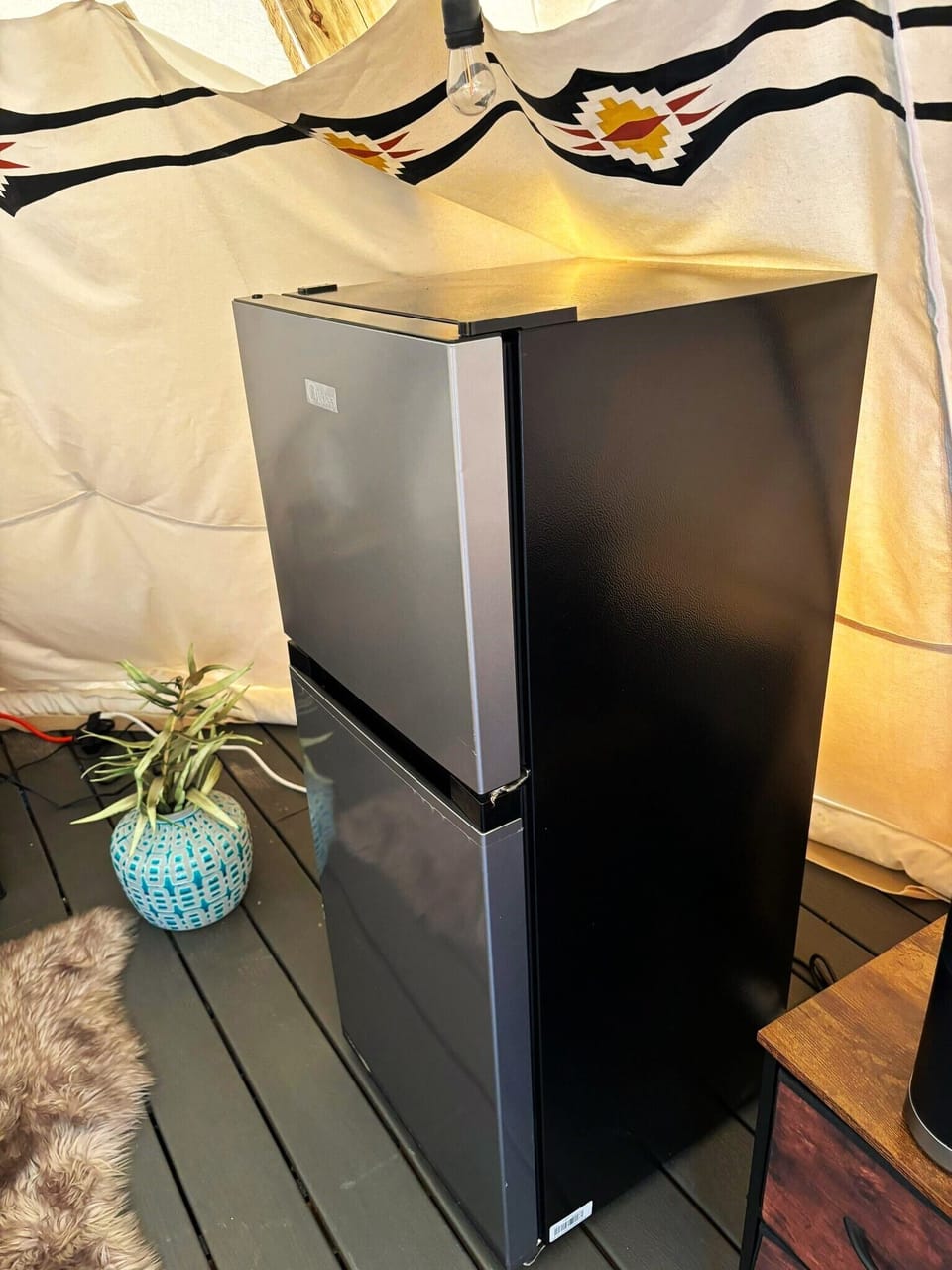 Mini-fridge with freezer. 