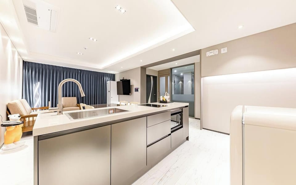 Premium bedding, free minibar items, desk, laptop workspace