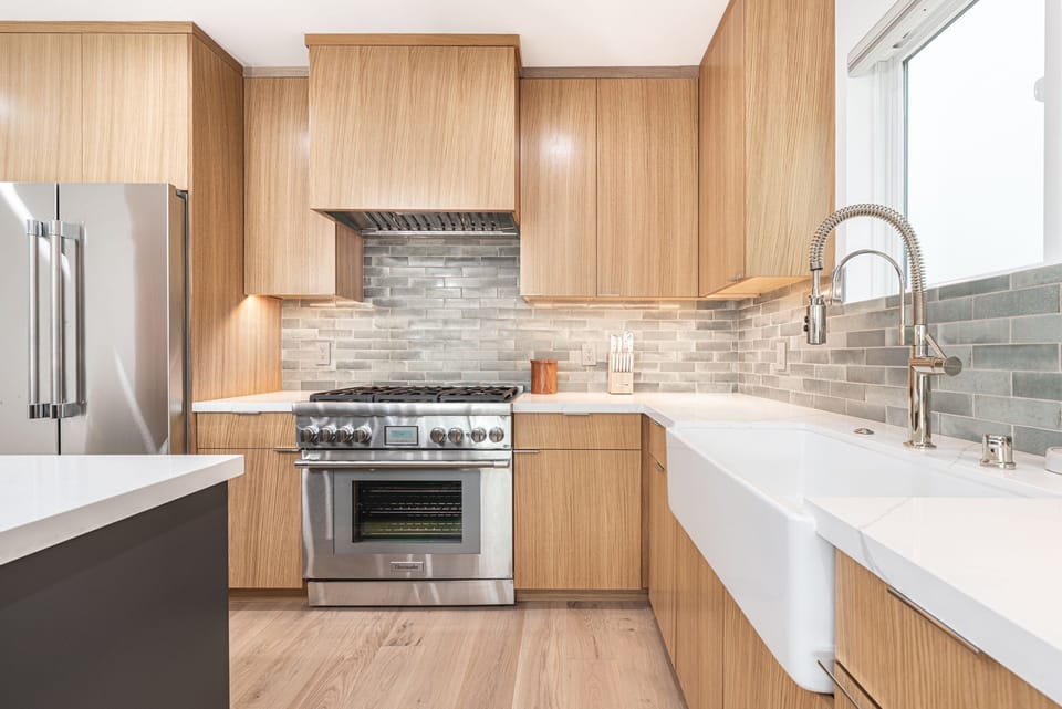 Our modern kitchen boasts all stainless steel large appliances for a stylish and efficient culinary experience.
                