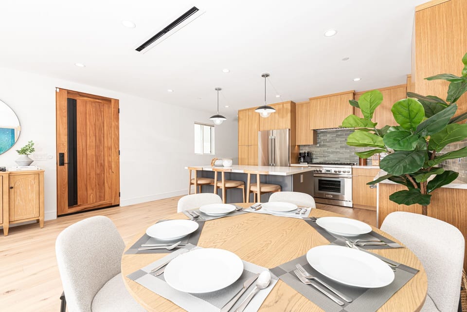 Dining table accommodates up to 6 guests.
                