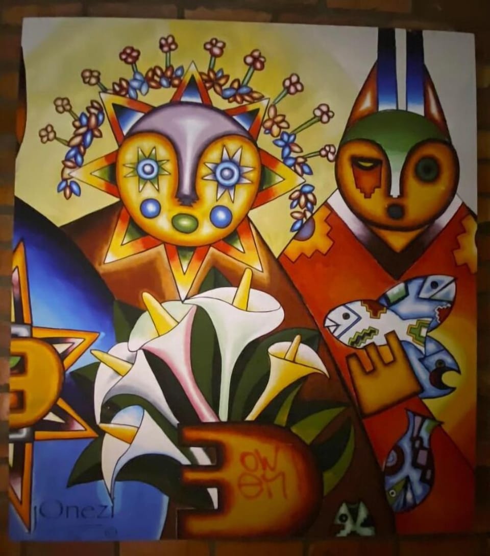 Owners photo of Bolivian art above Master bed