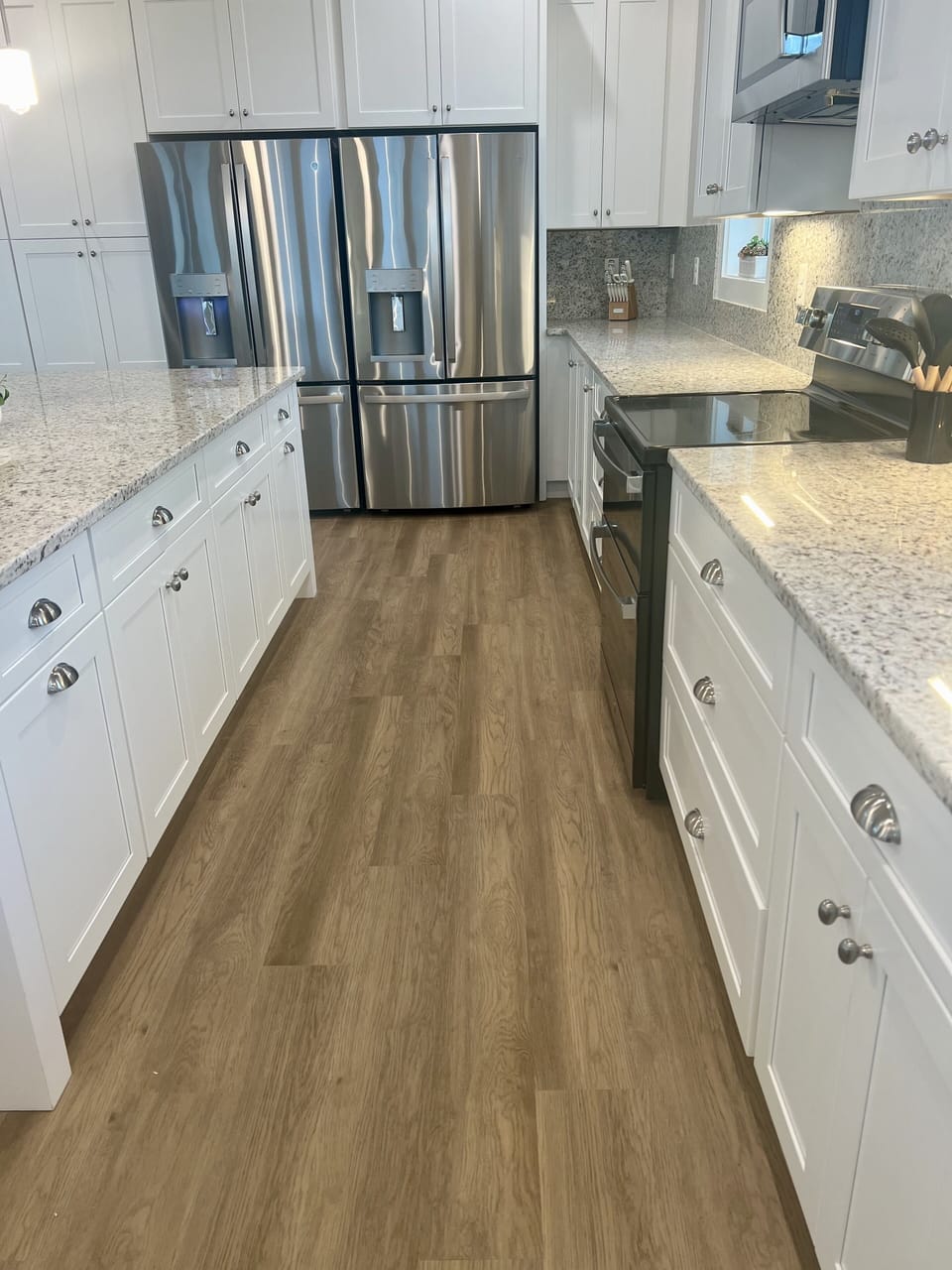 The kitchen is on the third floor with peeks of the beach and ocean.