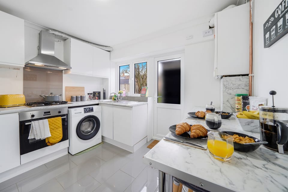 [Kitchen with toaster microwave  XL air fryer breakfast bar]