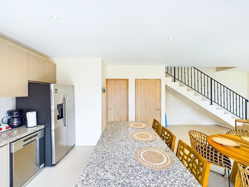 Open kitchen, stainless steel appliances,