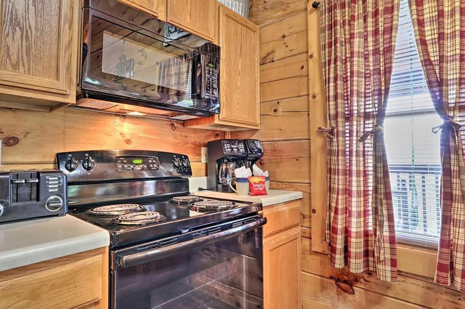 Oven, Stove Microwave, Coffer Maker and Toaster in Kitchen on Main Level.