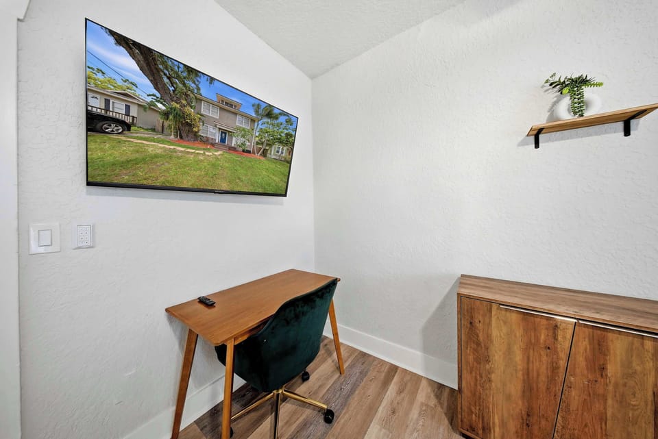 Catch up on emails or plan your day's itinerary at this cozy, dedicated work nook, complete with a sleek smart TV to stream your favorite background music