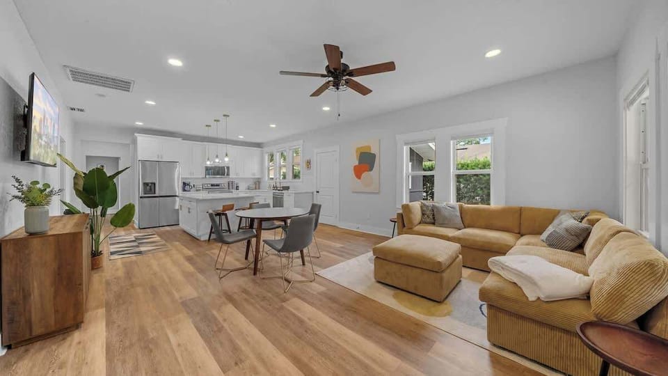 Live, laugh, and lounge! Modern open floor plan with airy spaces perfect for entertaining or relaxing in style