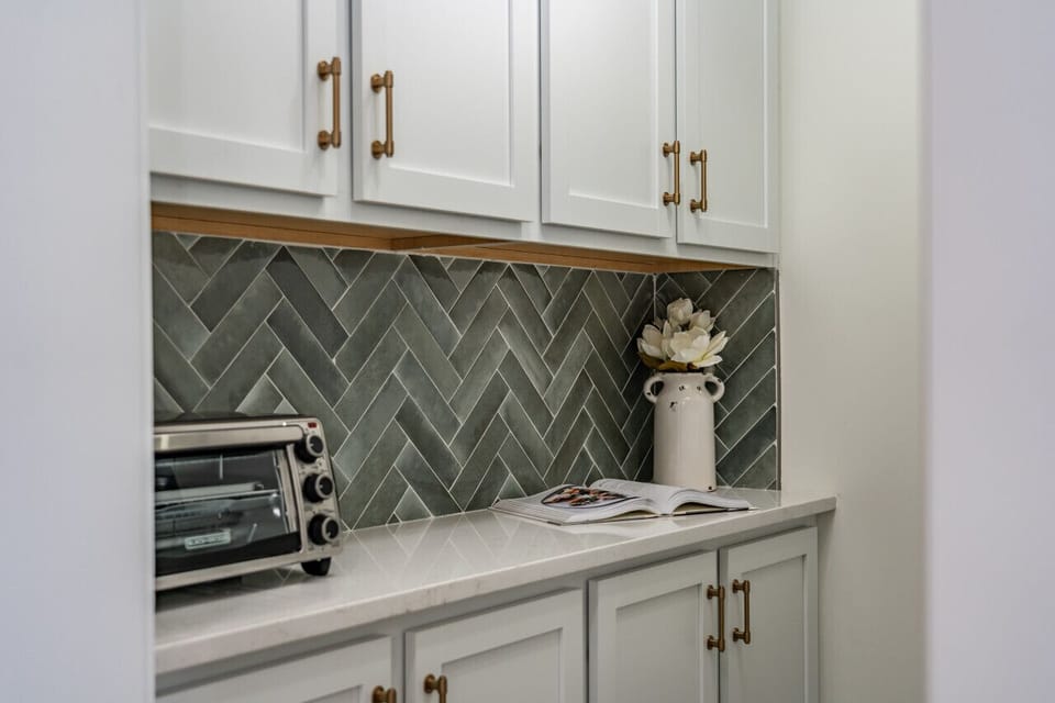 Toaster oven in pantry/laundry room