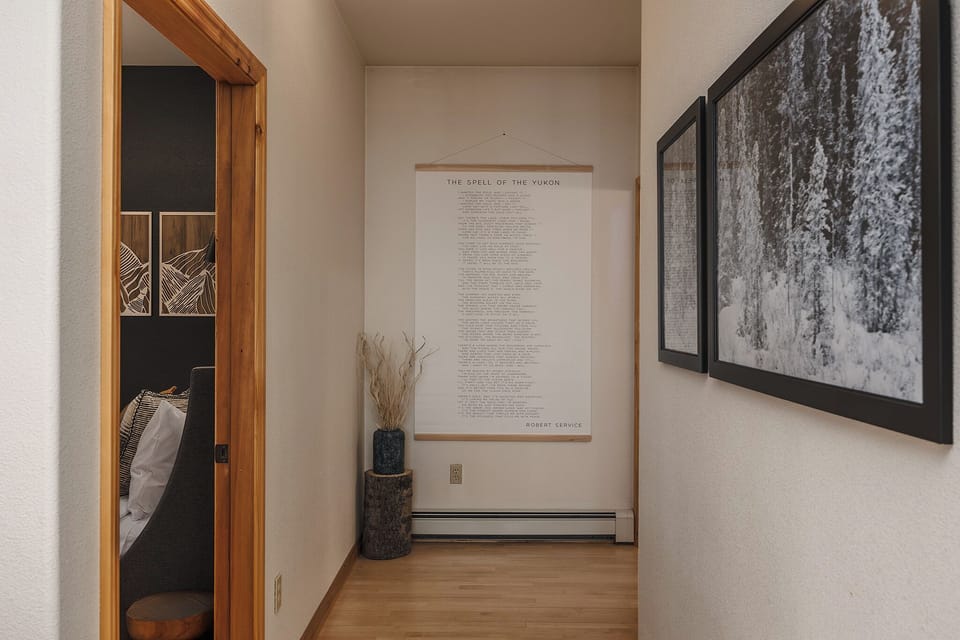 Hallway to downstairs bedroom and bathroom.