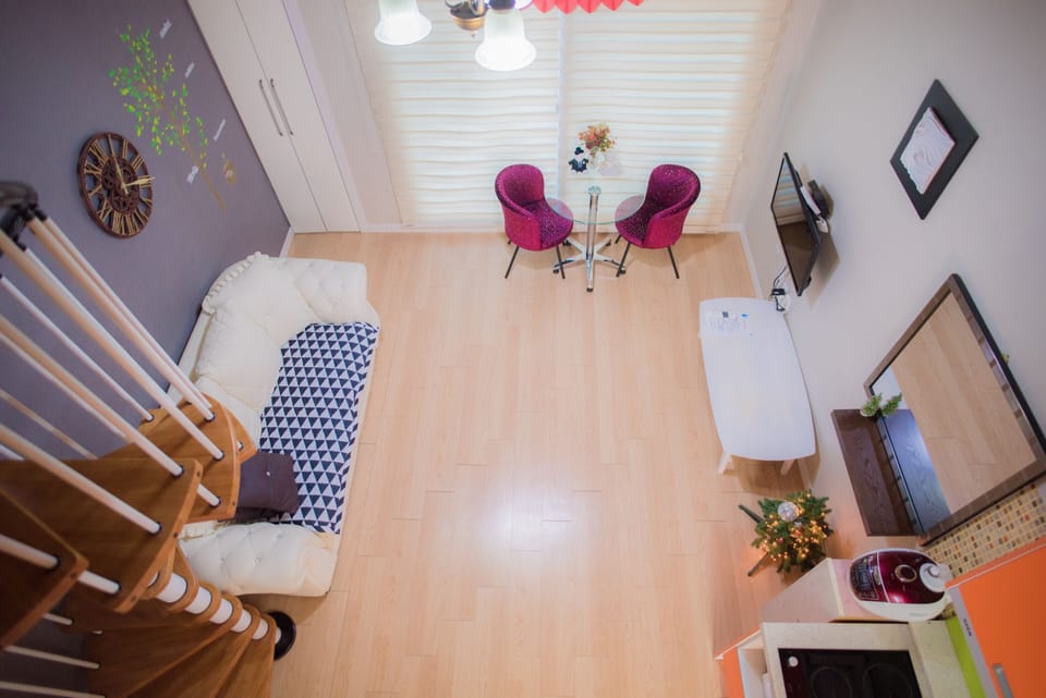 Standard Duplex | Living area | 50-inch LED TV with cable channels, heated floors