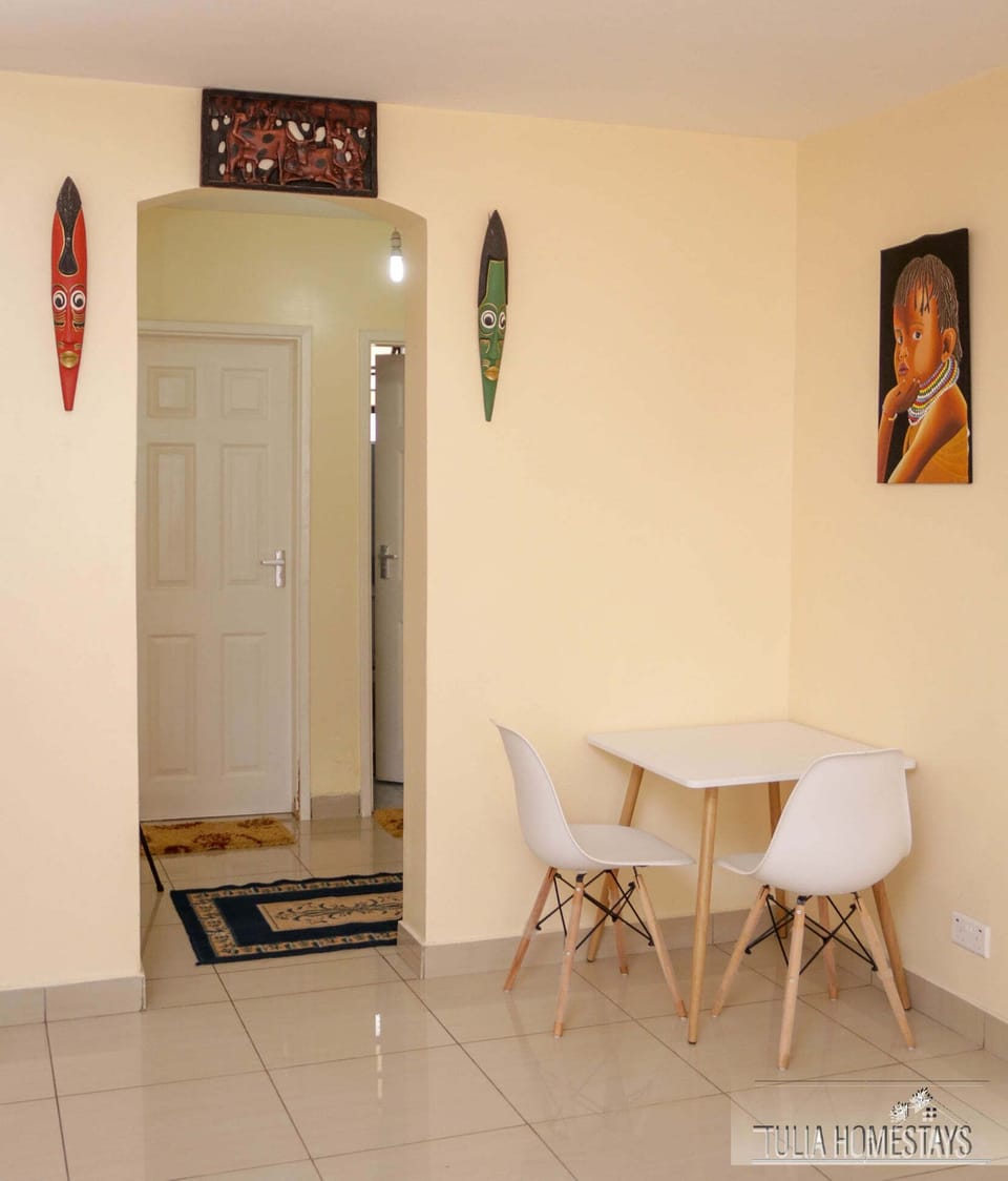 Business Apartment | Living area | 24-inch Smart TV with digital channels