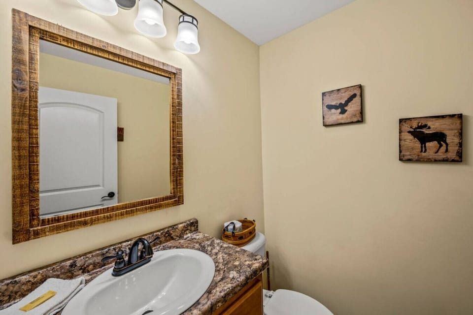 There is a half bathroom conveniently attached to this bedroom.