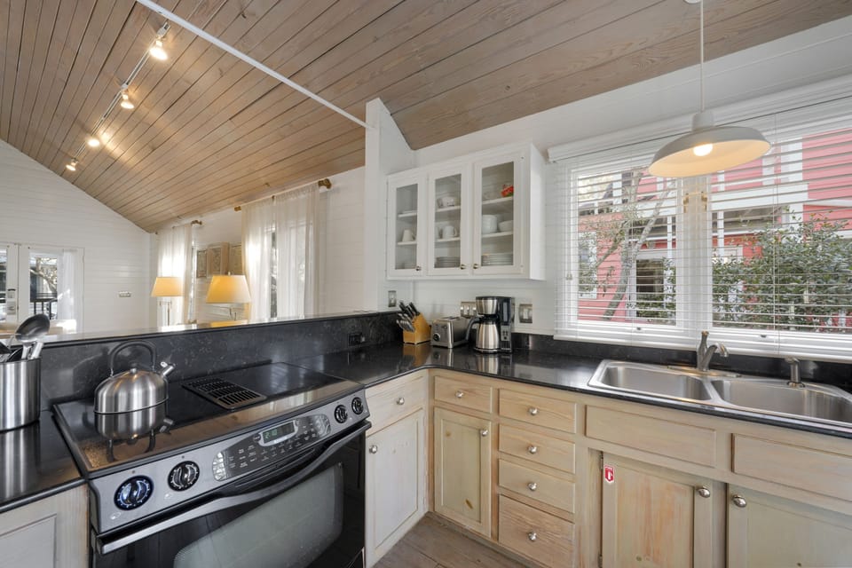 KITCHEN ALTERNATE VIEW FACING LIVING AND DINING SPACE
