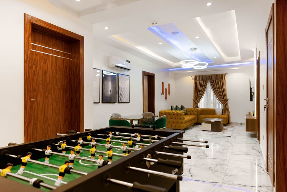 Presidential Apartment, 3 Bedrooms, Connecting Rooms | Living area | 42-inch Smart TV with digital channels