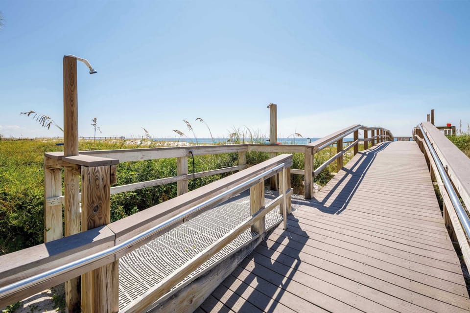 Beach boardwalk with shower