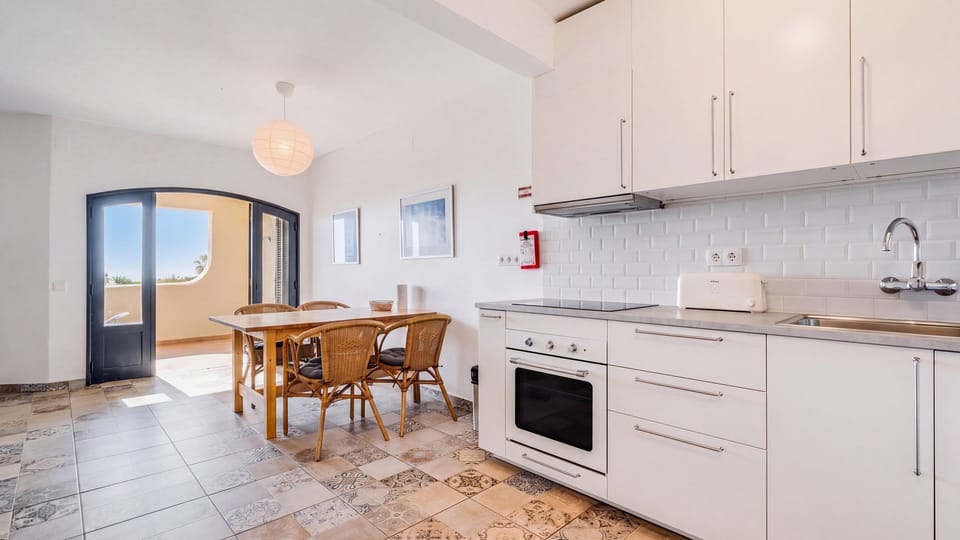 Keep your vacation wardrobe fresh with the convenience of an in-unit washer and the ability to dry clothes with the provided drying rack. This dedicated utility space makes longer stays effortlessly comfortable.