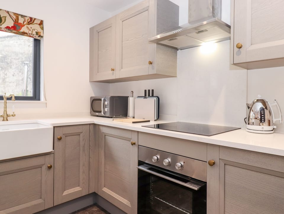 Fridge, electric kettle, toaster, cookware/dishes/utensils