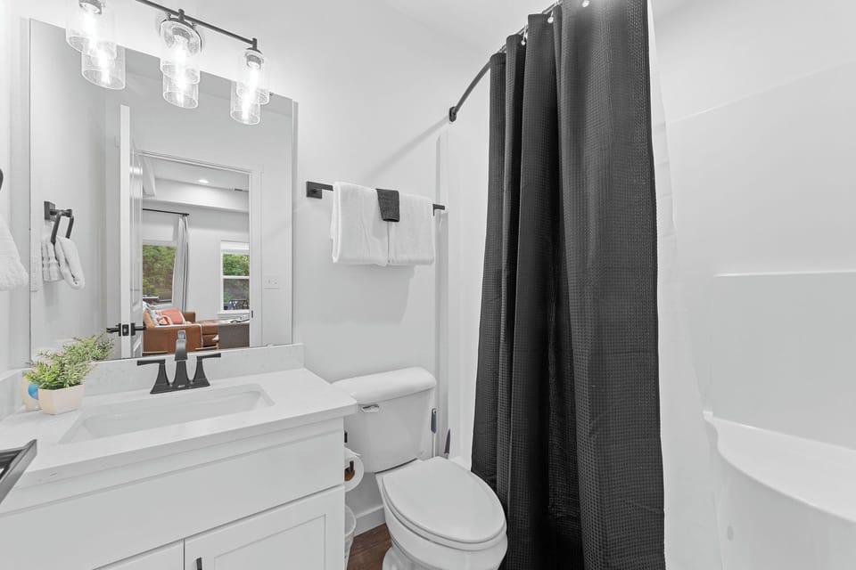 Freshen up with ease in the spacious walk in shower. Clean, modern, and conveniently located on the main floor.
