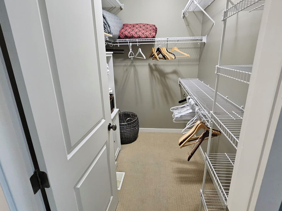 Primary suite with walk-in closet