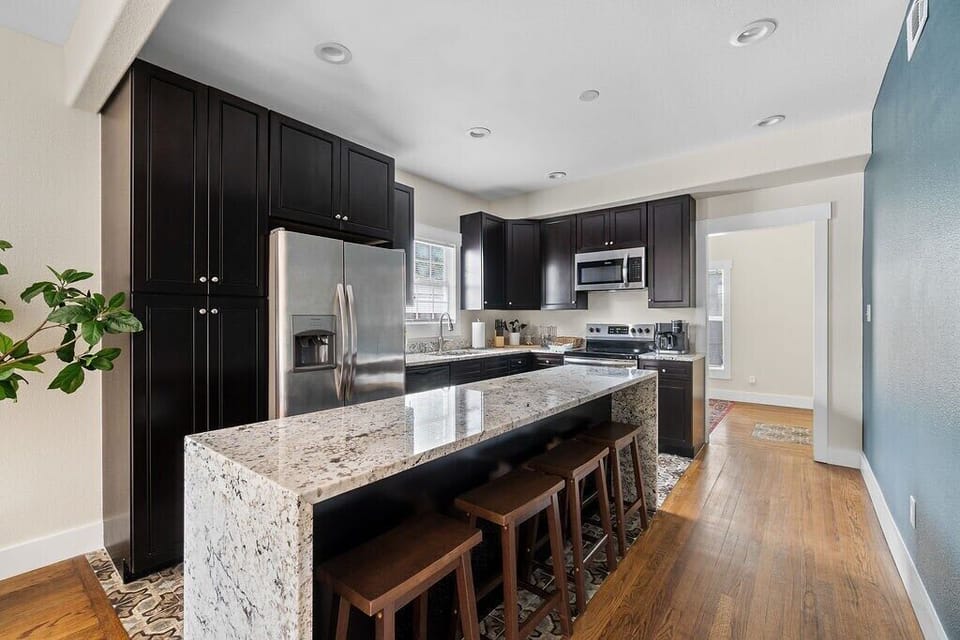 Plenty of seating and great coffee station with Keurig pod or coffee pot options as well as French press. The coffee station is stocked with k-cups, coffee beans, teas, sugar, and cream. There is a coffee grinder provided.