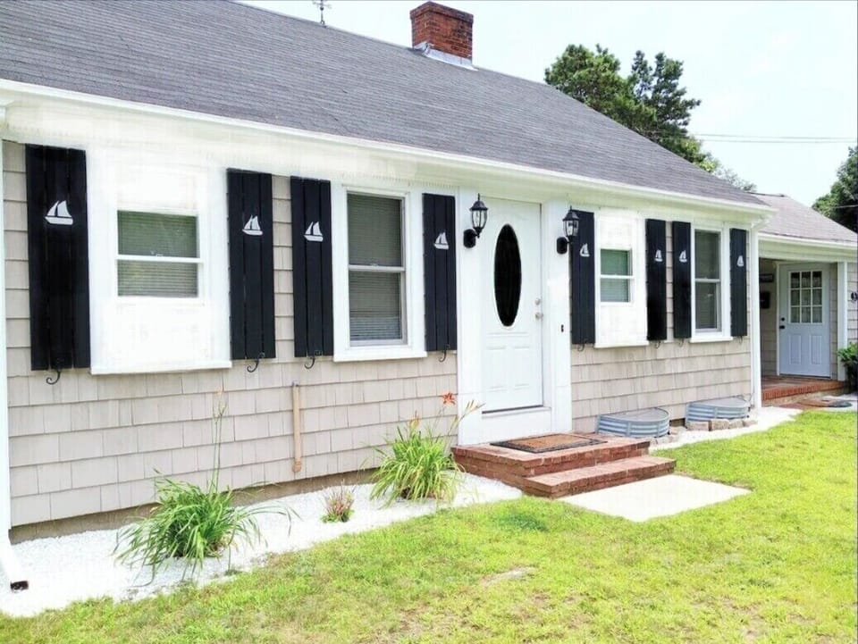 Cape Cod Village Home with Guest house included in the rear of this Main house. 