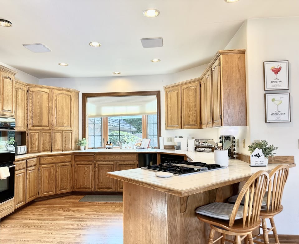 Large, open kitchen. Fully stocked for cooking a meal in. 