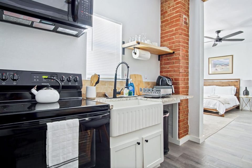 The kitchen invites you to create, with every tool at your fingertips and a layout that encourages flow.