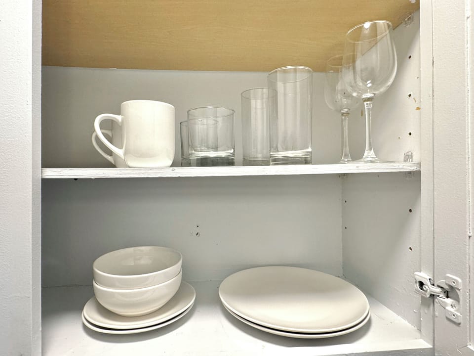 The kitchen offers sleek countertops and high-end appliances, making cooking a breeze