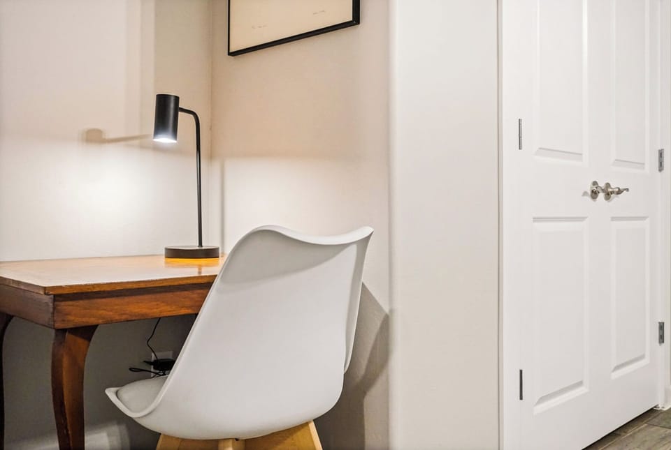 Rest and recharge in a beautifully crafted, serene bedroom.
