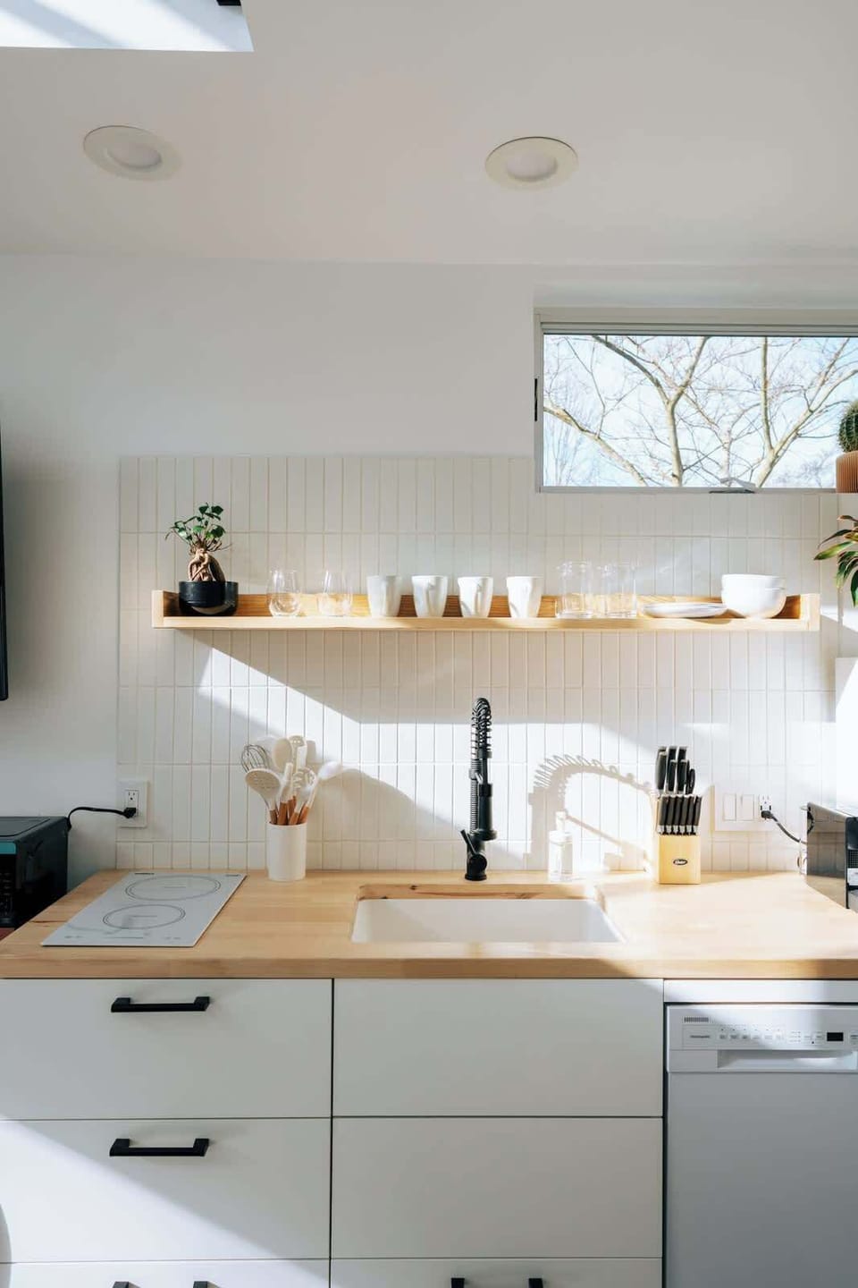 Convenience is key in this space, with the added bonus of a dishwasher to make cleaning up a breeze.