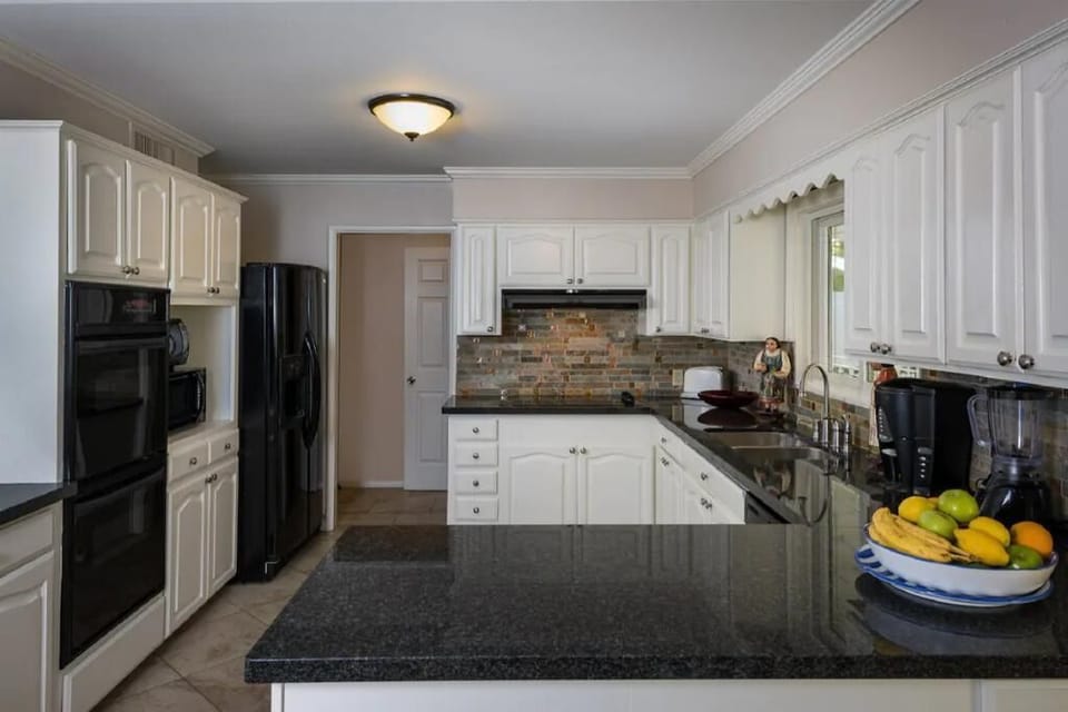Modern Kitchen with 2 ovens fully stocked to prepare your meals