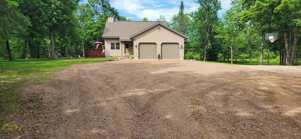 Driveway with plenty of parking for trucks, trailers, ATV's or snowmobiles.