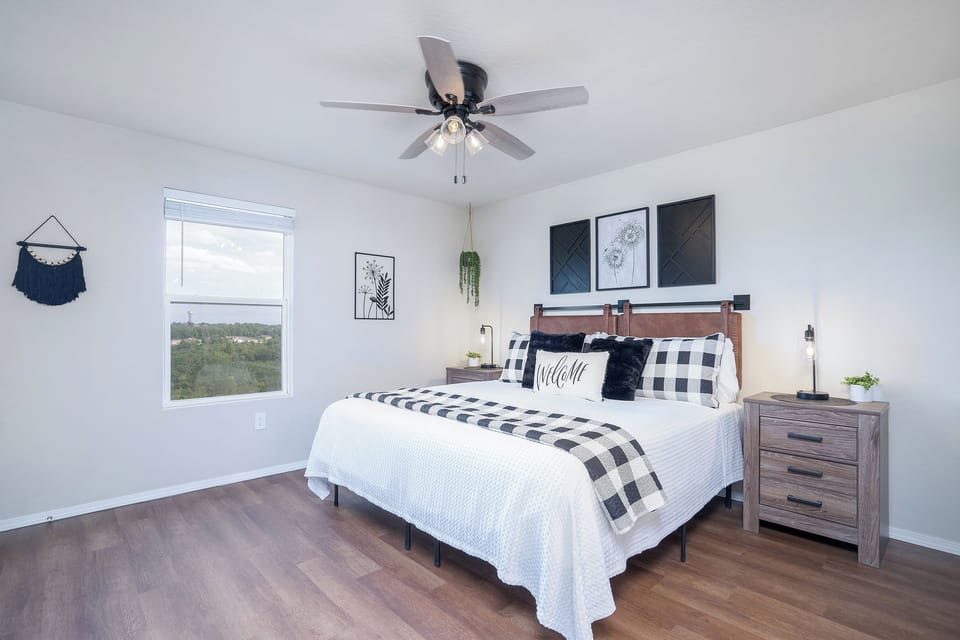 Drift into dreamland surrounded by luxurious linens, plush pillows, and chic decor.