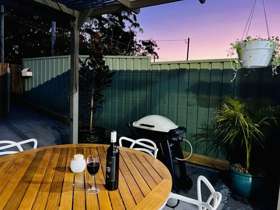 Outdoor dining and BBQ. Tomaree National park across the road