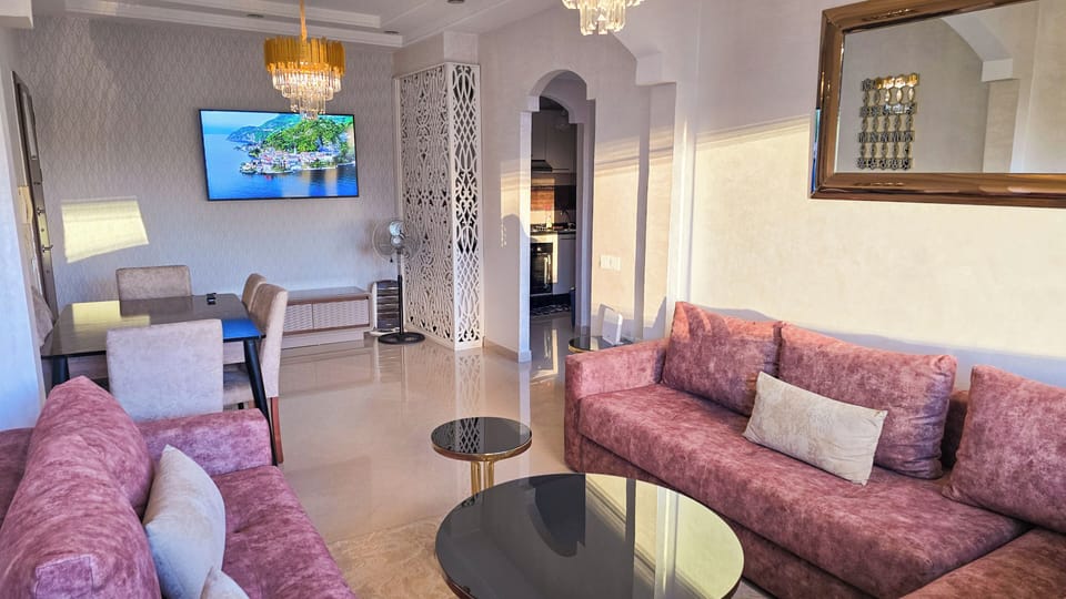 Luxury Apartment | Living area | 65-inch Smart TV with digital channels, Netflix, first-run movies