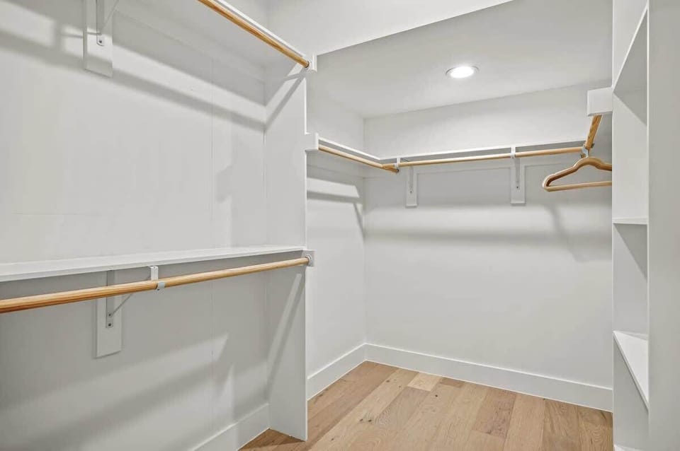 Oversized primary bedroom closet.