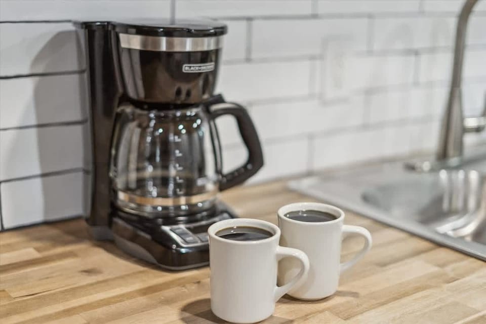Start your mornings right with fresh brews in this charming kitchen corner!