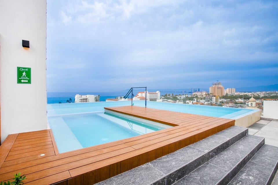 Infinity rooftop pool with ocean and city views