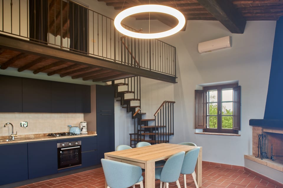 Exclusive Condo | Living area | 65-inch flat-screen TV with digital channels, Netflix