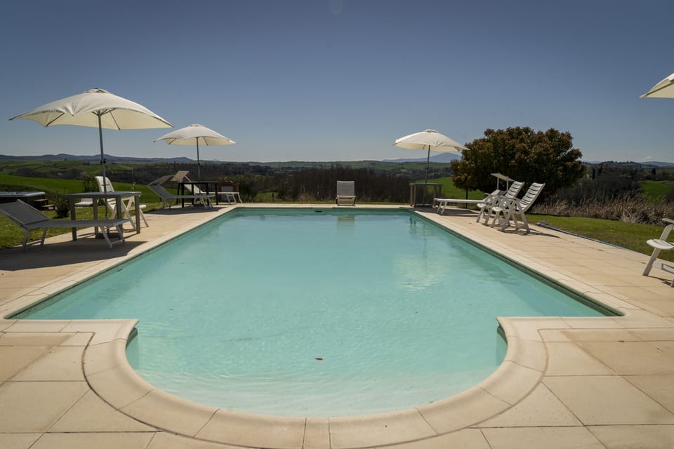 Seasonal outdoor pool, pool umbrellas, sun loungers