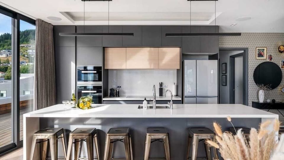 Gourmet Kitchen with Premium Appliances
Cook in style in the fully equipped kitchen, featuring high-end appliances, ample counter space, and modern design, ideal for preparing meals with ease.
