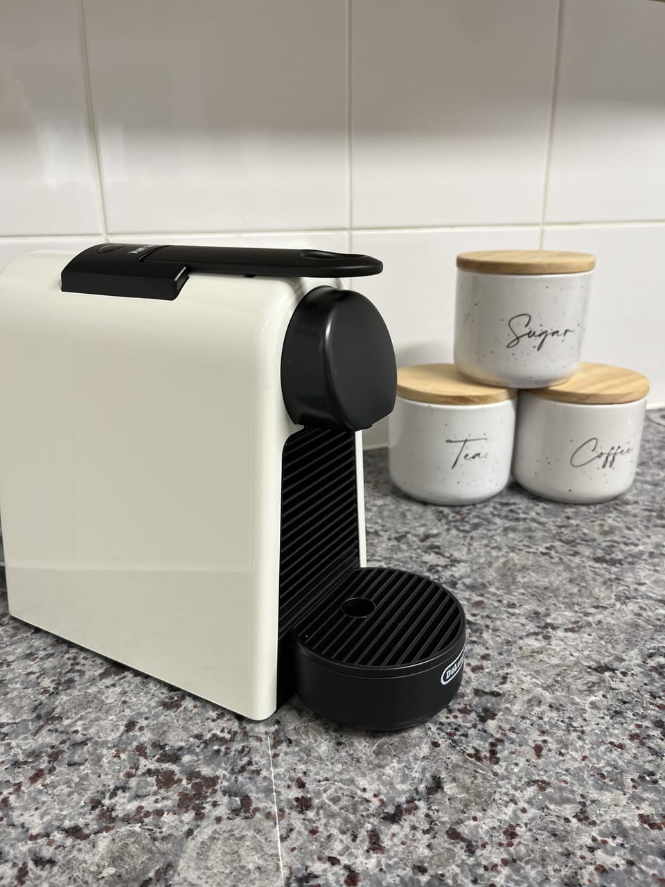 Nespresso machine - we include starter coffee capsules for you to enjoy