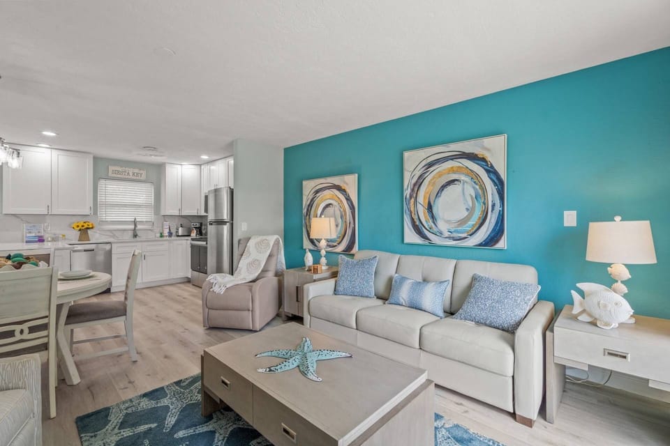 Relax in the newly furnished living room after a fun filled day at the beach!